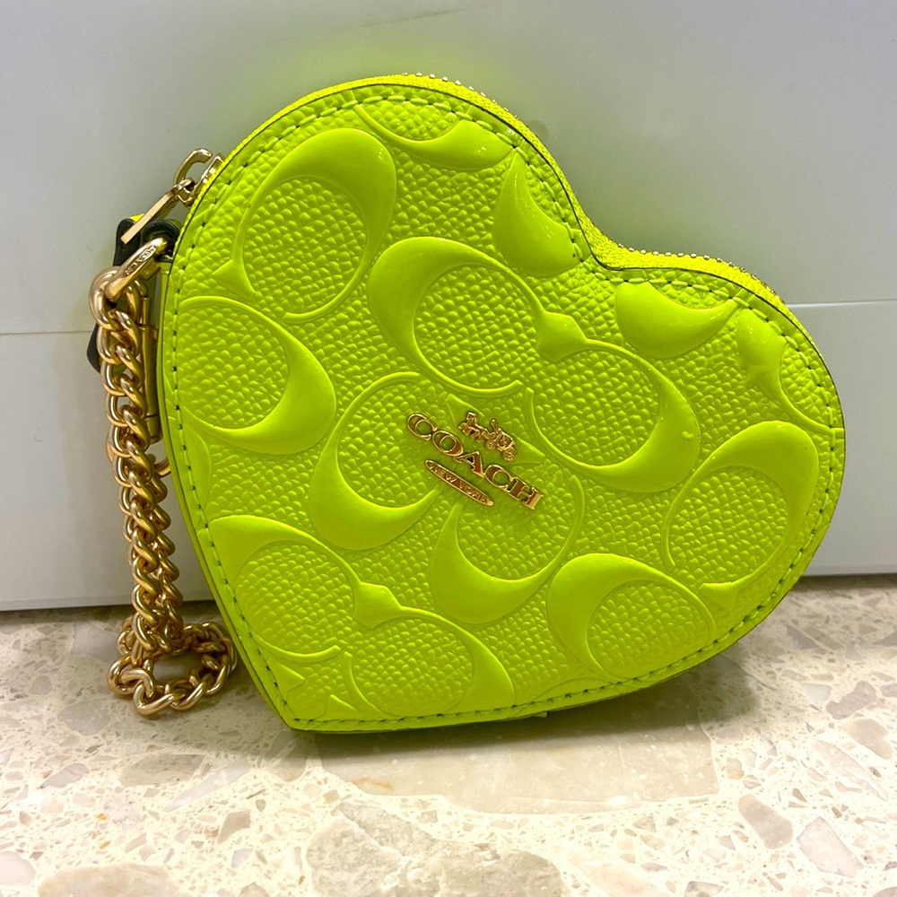 Coach heart shaped wristlet purse.